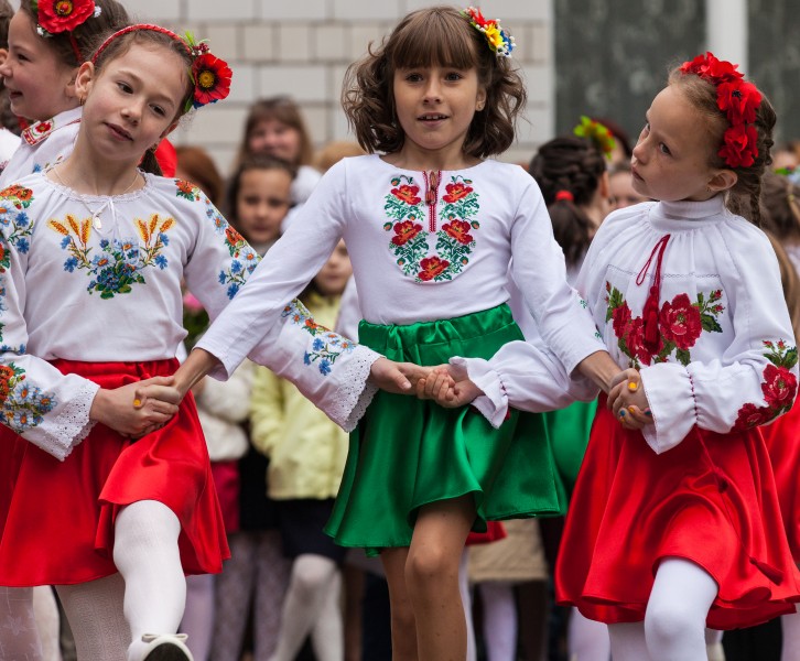 young schoolgirls dancing in May 2014