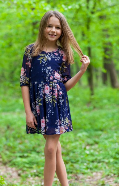 a cute 12-year-old girl photographed in May 2015, picture 1