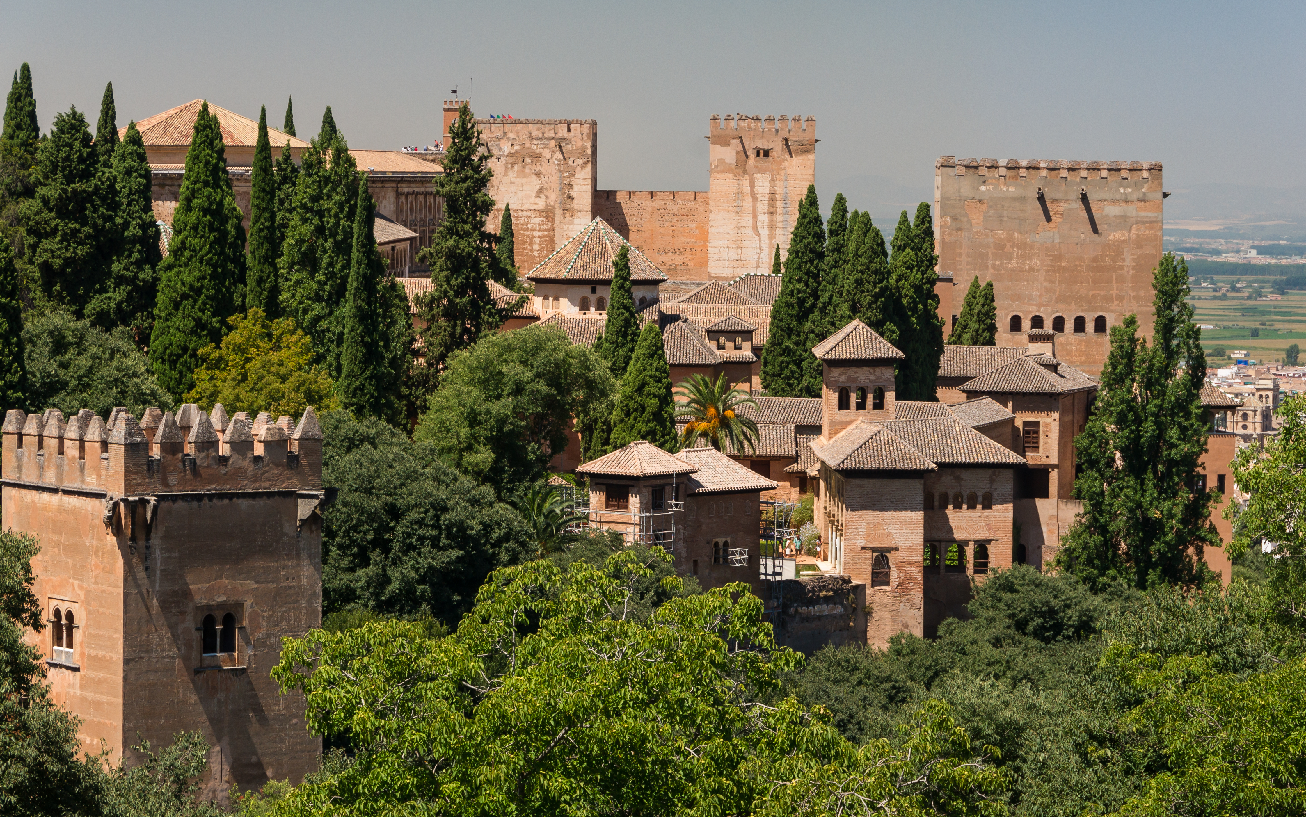 Various roofs and towers of Alhambra, from Generalife gardens, Granada, Spain