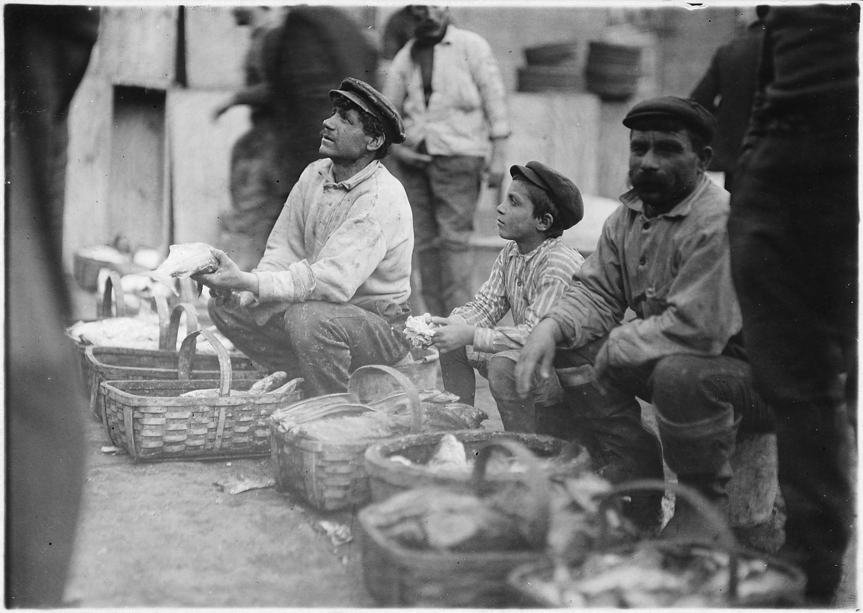 A typical fisher boy at T Wharf. Boston, Mass. - NARA - 523219