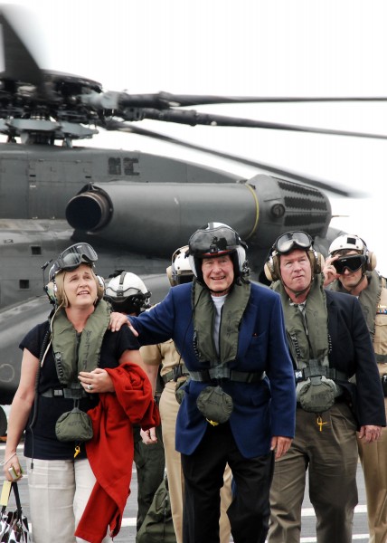 US Navy 090526-N-1981M-126 Former U.S. President George H.W. Bush and his daughter, Doro Bush Koch, walk across the flight deck of the aircraft carrier USS George H.W. Bush (CVN 77)