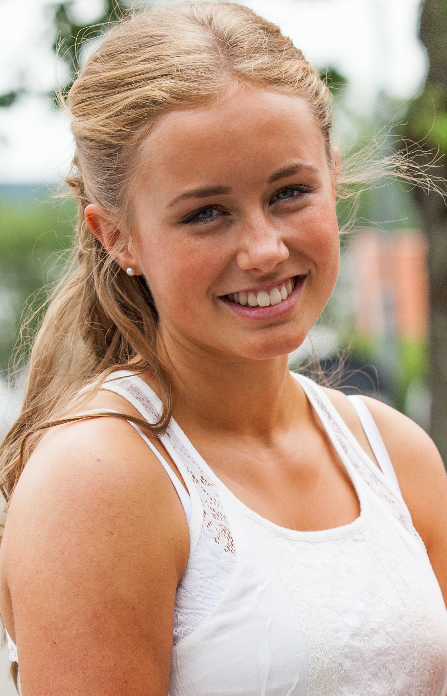 Photo of a blond beautiful girl photographed in Sigtuna, Sweden in June