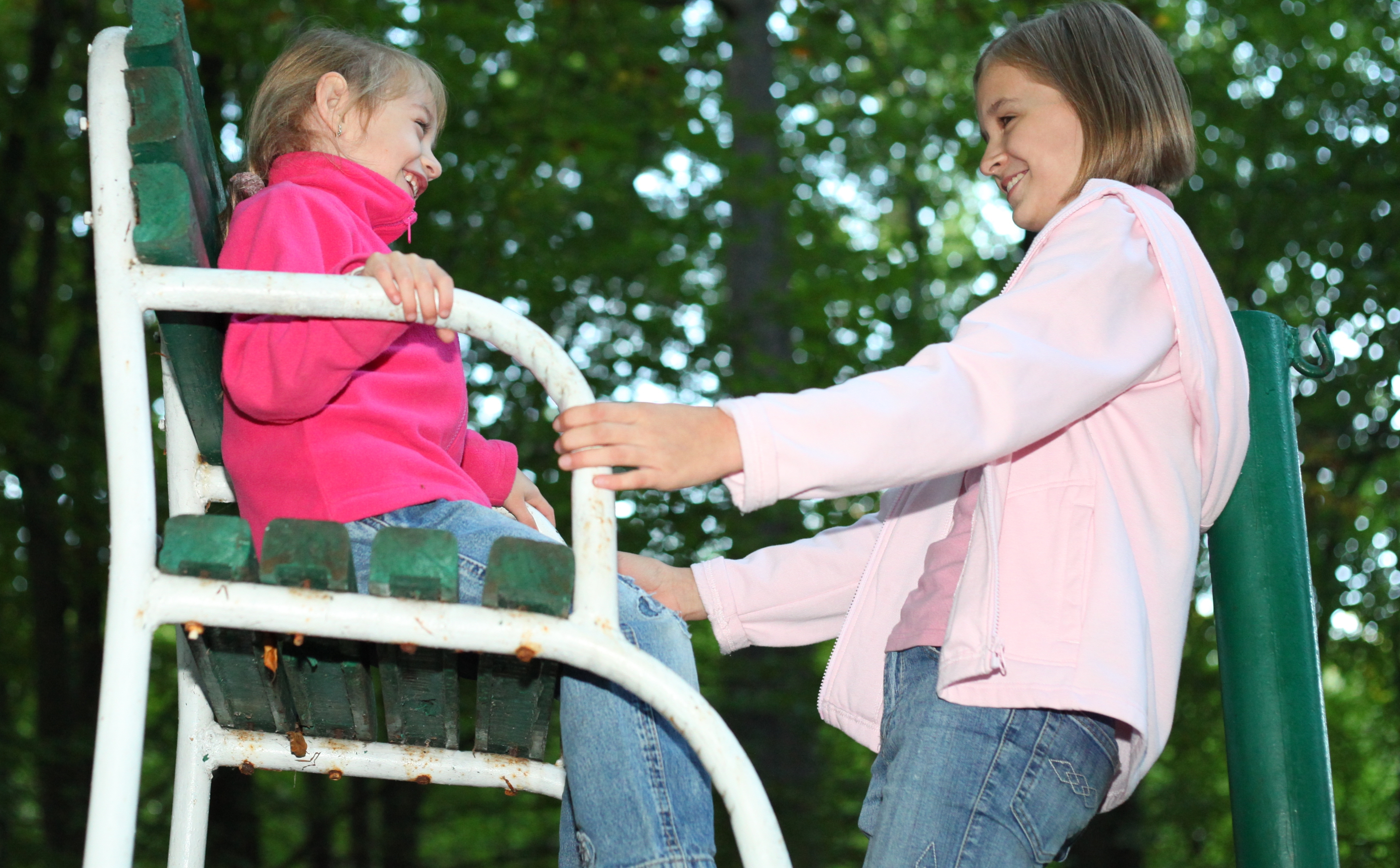 two cute Catholic child girls in a park, photo 36