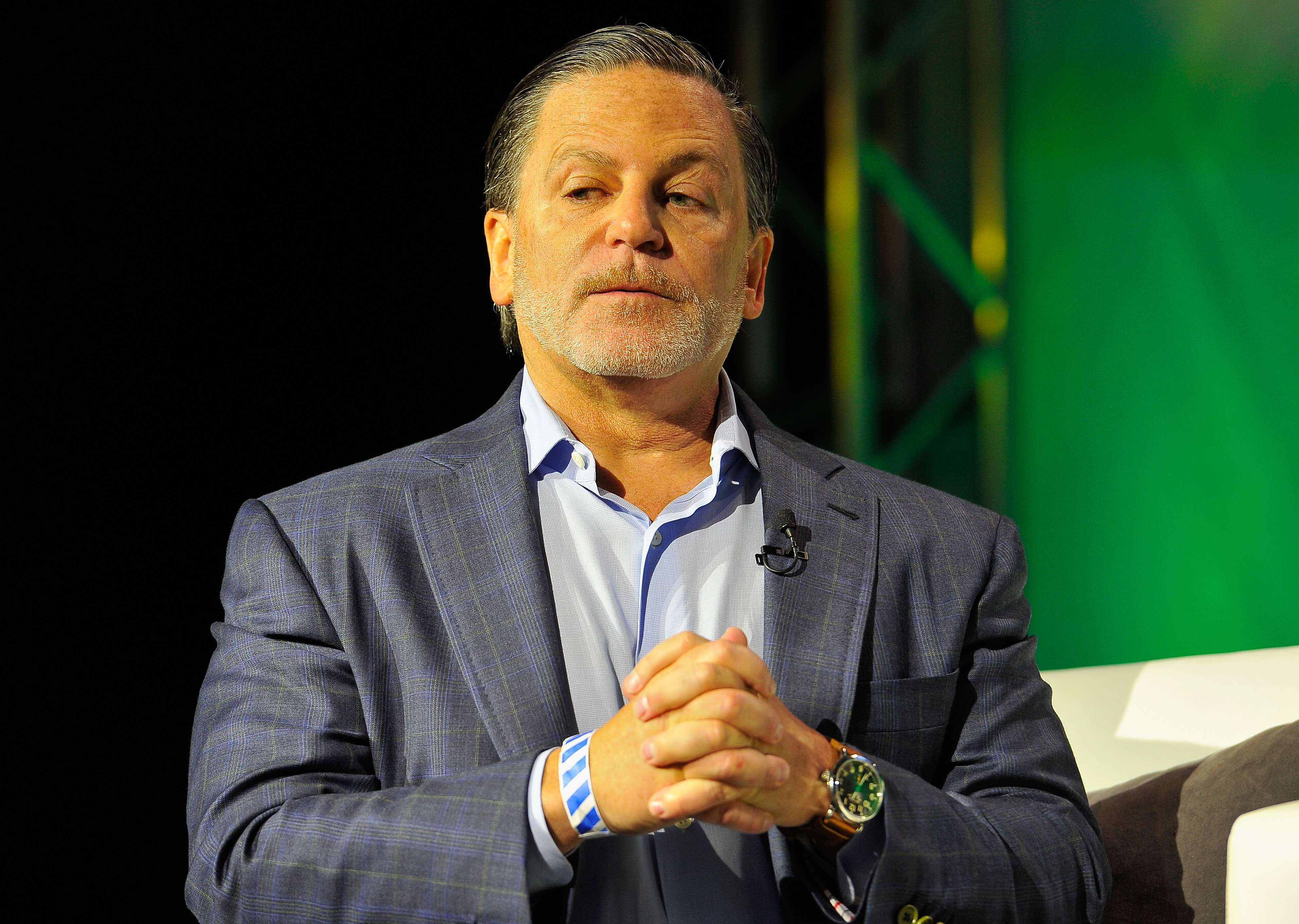 Dan Gilbert speaking onstage