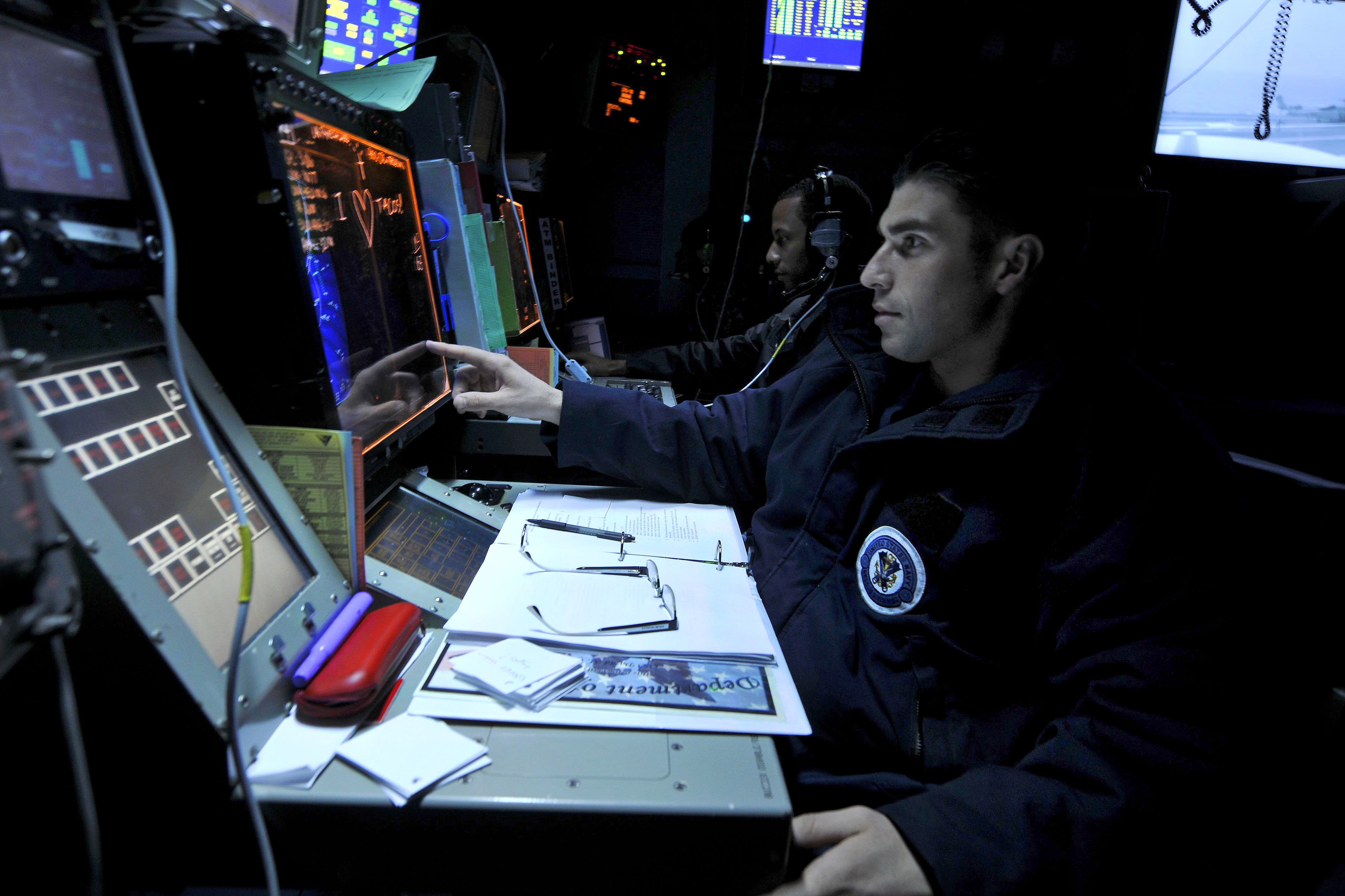 Defense.gov News Photo 110702-N-EE987-044 - Petty Officer 3rd Class David Gomez tracks aircraft aboard the aircraft carrier USS Ronald Reagan CVN 76 in the Arabian Sea on July 2 2011. The