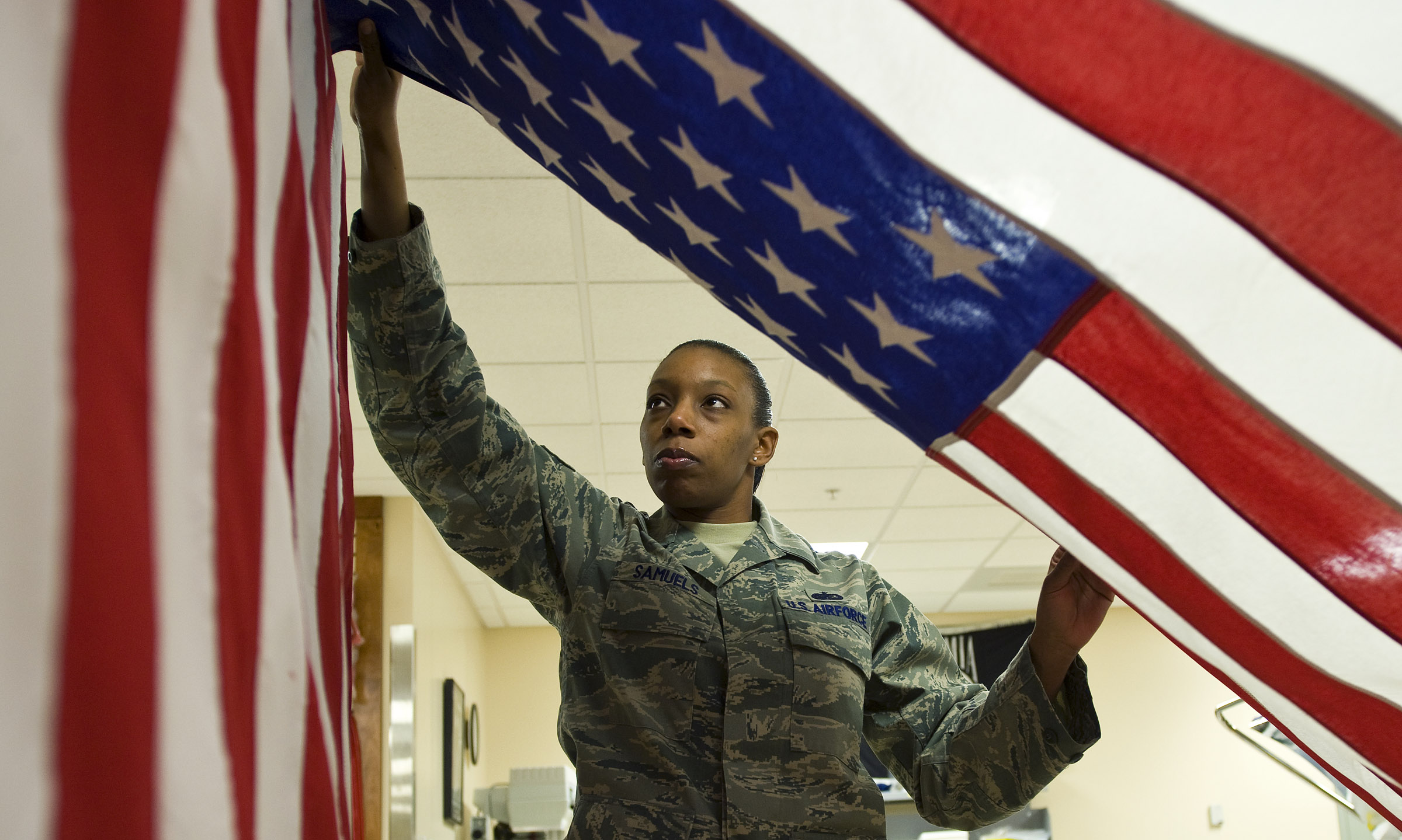 Hanging up a freshly pressed U.S. flag