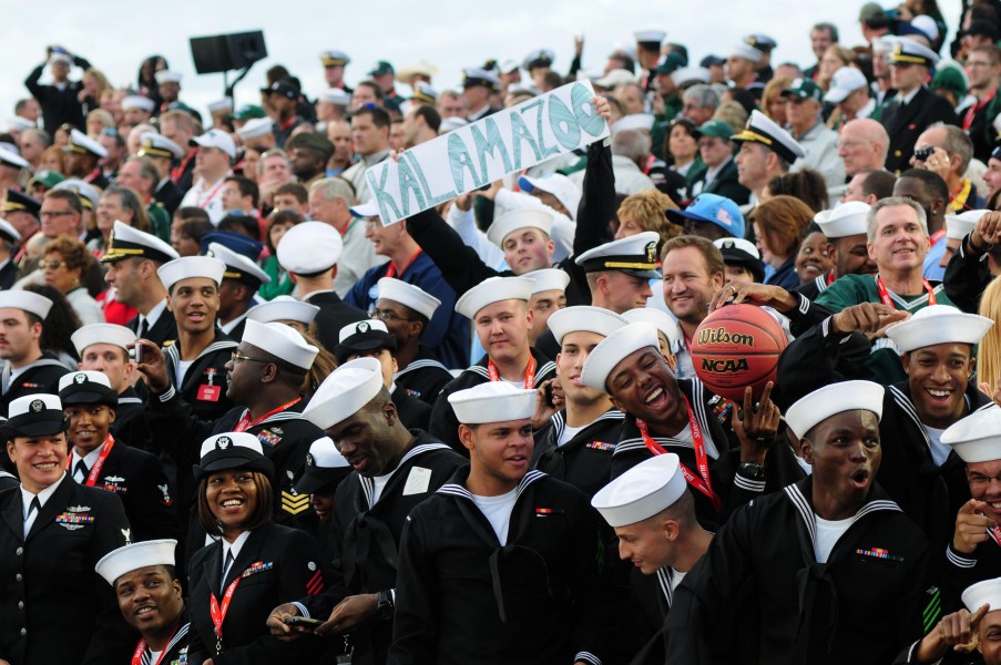 US Navy 111111-N-SB672-327 Sailors assigned to the Nimitz-class aircraft carrier USS Carl Vinson (CVN 70) watch the Quicken Loans Carrier Classic 