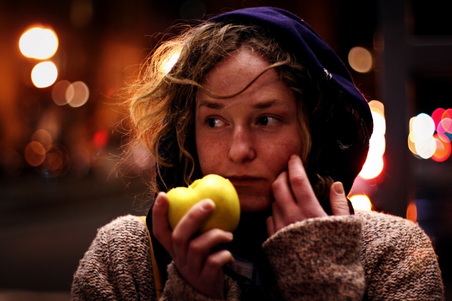 Woman eating an apple