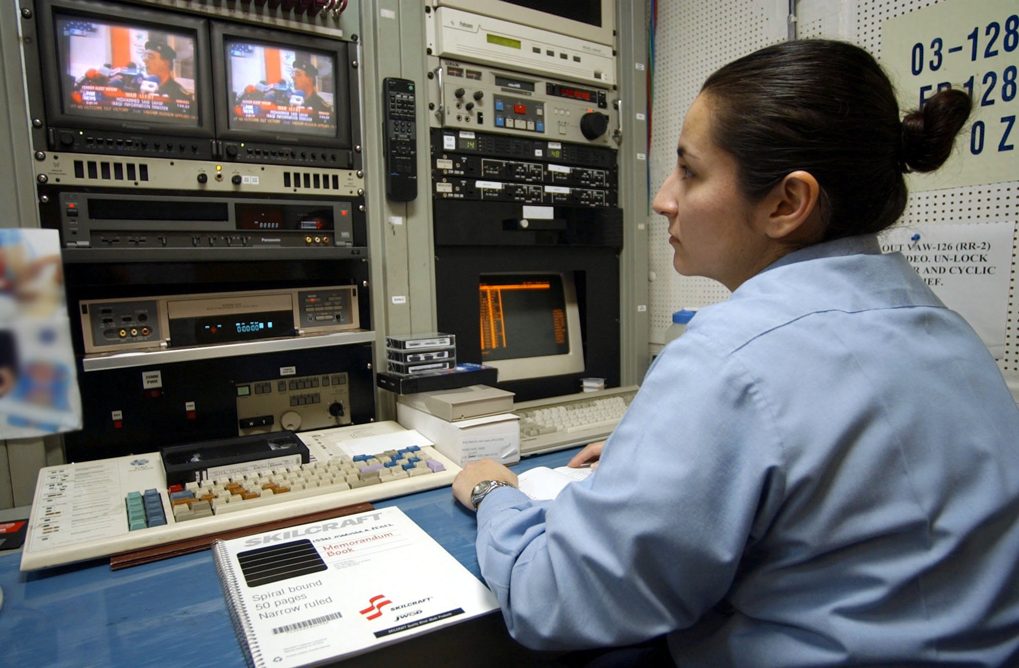 US Navy 030320-N-1058W-004 Intelligence Department personnel create a flight brief in the carrier intelligence center (CVIC)